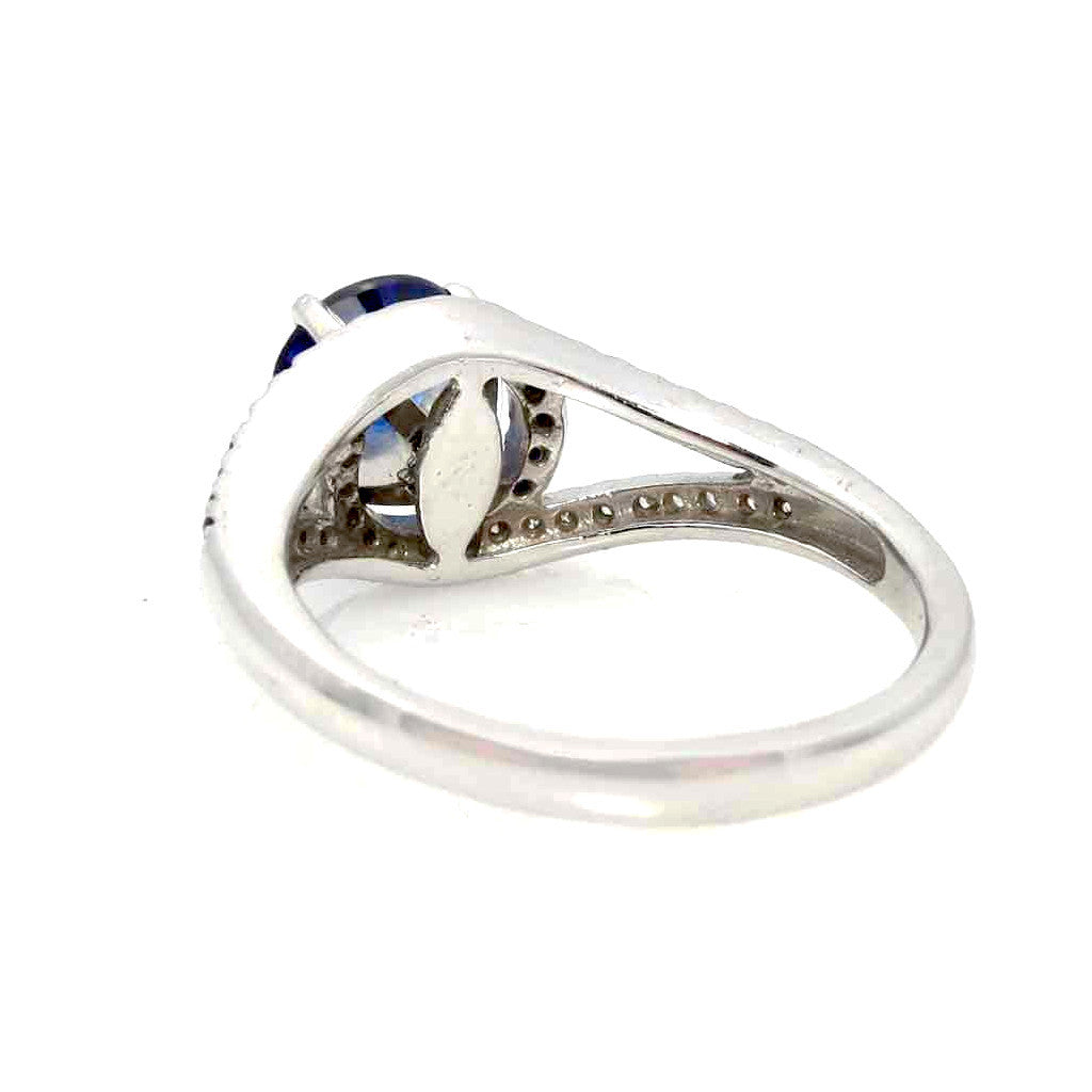 Split Shank Halo White Gold 1.4 Carat Blue Sapphire Gemstone In The Center With Diamonds And Sapphire Accent Stones Engagement Ring - SP94618ER